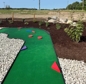 Brightly colored pre-designed AGS faux wood obstacles are used to challenge golfers on many holes