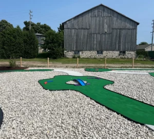 Cement pathways connect the mini-golf holes at Pinetree Campground and Resort in Ontarior, Canada